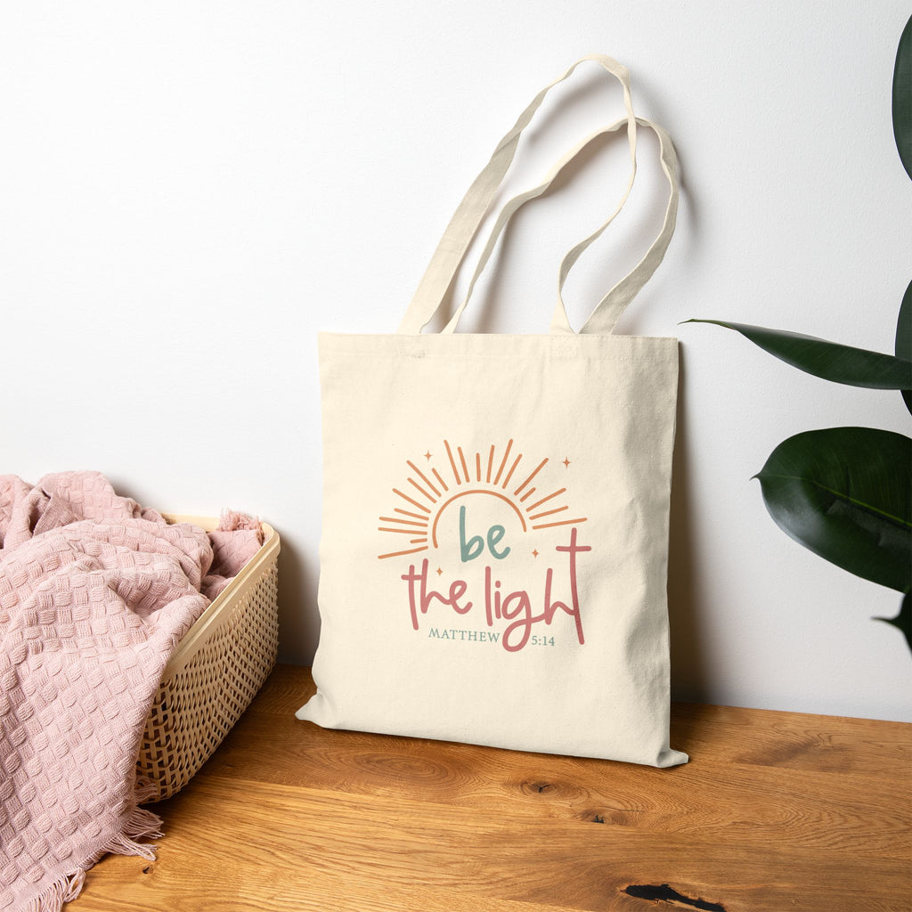 Be the Light sunburst Tote Bag | inspirational scripture Matthew 5:14